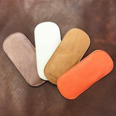 Genuine leather Osgoode Marley eyeglass cases.