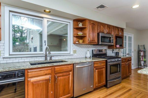 Stainless steel appliances, Center Island Kitchen.