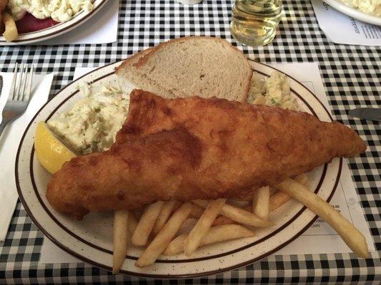 Beer battered fish fry & sides: rye bread, coleslaw, mac salad, potato salad, french fries, and beets.