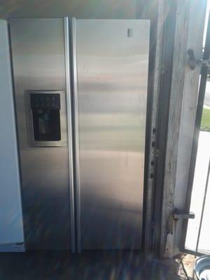 GE Profile side by side 68.75 in. tall, 35.75 in. wide counter depth, clean, ice/water, lots of storage in freezer and fridge.