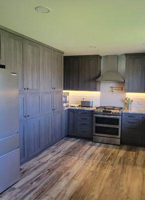 Ample storage in this rustic modern kitchen.