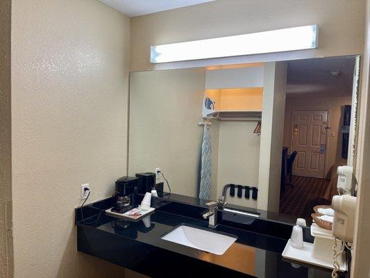 Sink and coffee machine.