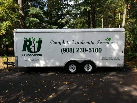 Cut vinyl applied to other clean side of trailer.