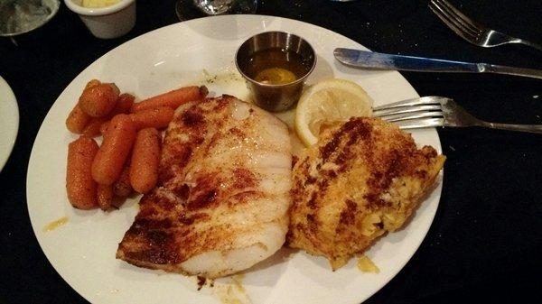 Baked cod with glazed baby carrots and parmesan potatoes.