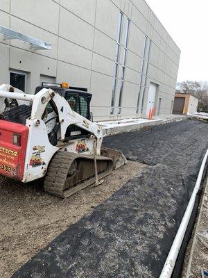 Bobcat getting us ready for brick paving!