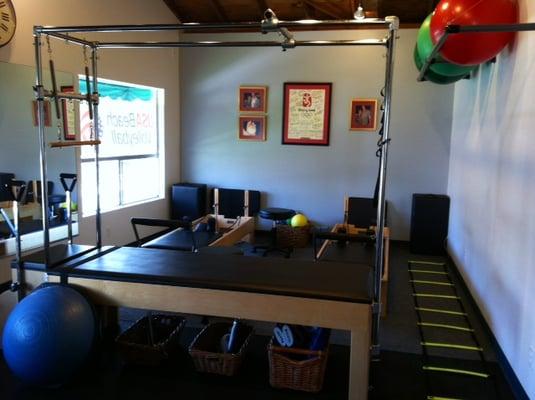 One of our patient clinic's equipped with state of the art PT equipment and a view of the outdoors.