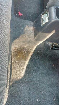 This is the puddle in the back seat of my car 24 hours after Glendale Auto left it in the rain overnight