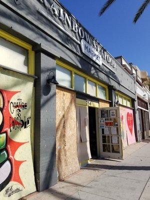 Building facade. Looks like they kept the murals and windows boarded up after the 3/31/2020 riots.