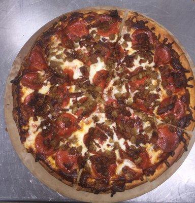 Pepperoni, sausage, bacon pizza