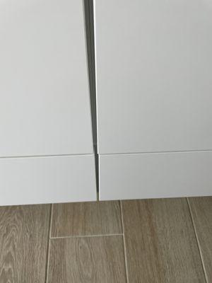 Kitchen cabinets not aligned.