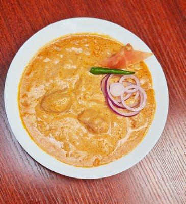 Butter Chicken - it's cooked in a subtle creamy, tomato sauce with Indian spices and aromatics