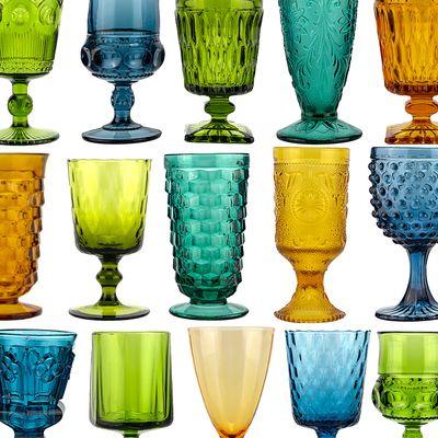 Teal, olive green and amber goblets for rent.