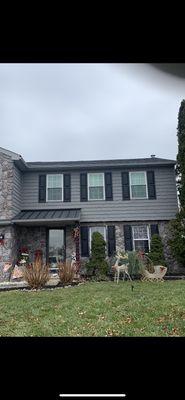 New dimensional roof along with new cedar impression siding