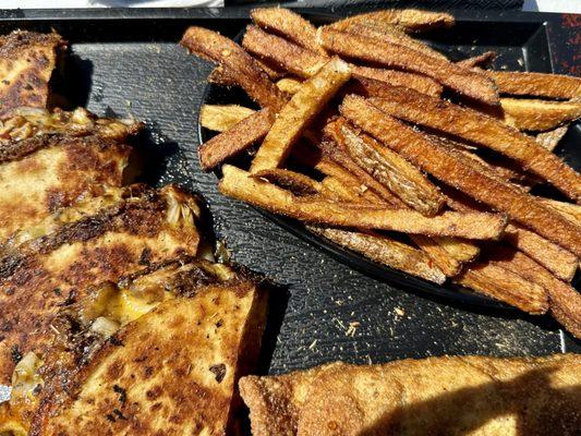 Jerk chicken quesadilla with side of fries