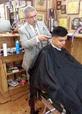 Master barber Pete Lira creating a high fade.