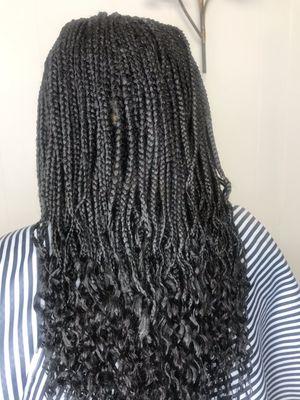 Fresh box braids with curled ends