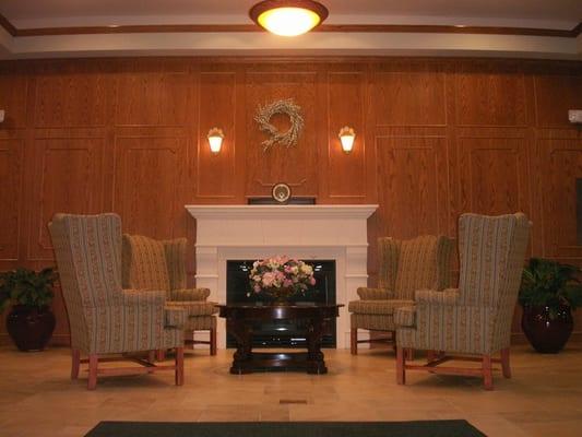 Our inviting lobby, graced with oak trim and fireplace, is the perfect place to greet visitors.