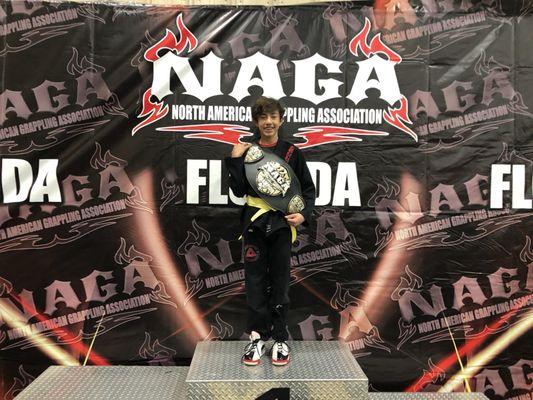 Winning his age group division @ NAGA FL