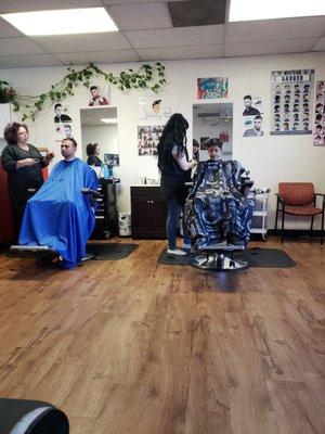 The ladies at Barber Shop Chronicles rocking haircuts on a Saturday