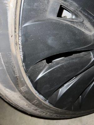 rear passenger wheel damage