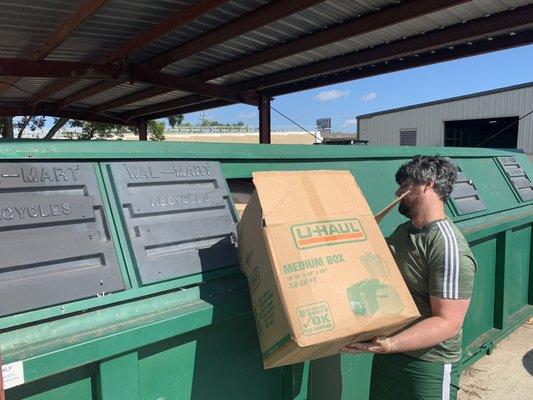 Unloading newspaper.