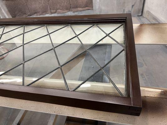 Vintage leaded glass windows will be reinstalled with new color matched windows.