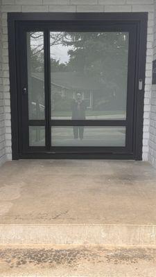 Modern custom front enterance Pivot Door.