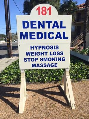 Look for this dental/medical sign out front