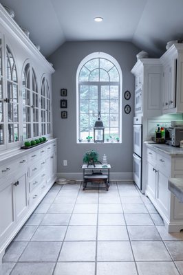 Kitchen cabinetry sprayed in Wevet by Farrow & Ball