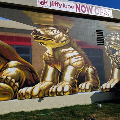 Lion, Tiger, and Bear painted mural to look like support columns