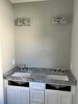 Quality self-closing cabinets and nice bathroom amenities.