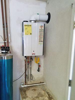 Rinnai tankless water heater replacing a standard water heater