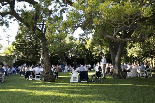 Dinner area is spacious and has beautiful old trees.