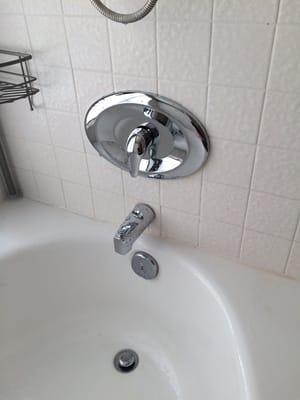 Single-handle Moen shower valve installation requiring no tile or drywall patch.