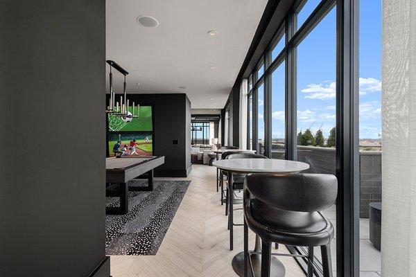 Indoor/ outdoor Sky Lounge with billiards and lounge seating