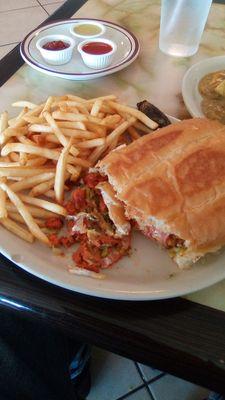 Al Pastor Torta and fries with a little salsa at El Charro Mexican Grill...La Cruces.