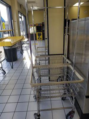 Lots of laundry carts available for your convenience.