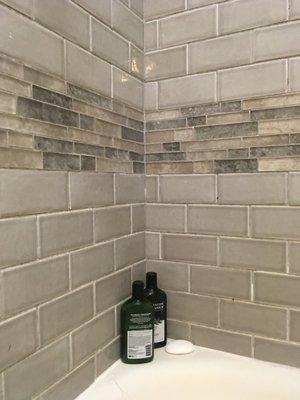 Installed accent tile in shower