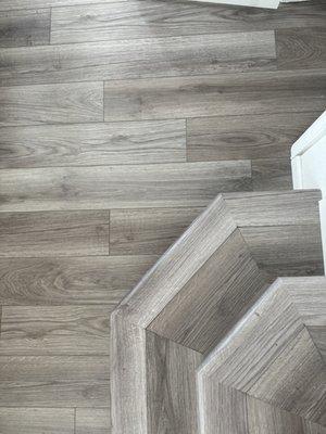 The edges of the stairs are a batch of new Shaw product that matches my original flooring.