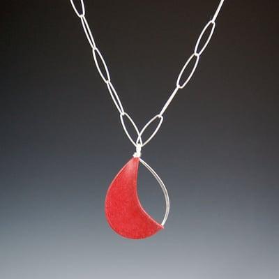 Handmade paper jewelry by Tia Kramer