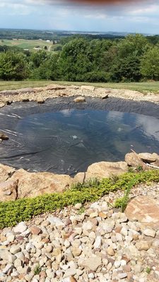 Pond installation completed in the Summer of 2023. With a large stone border and river gravel added for design.