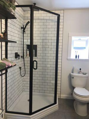 Neo angle shower doors in matte black