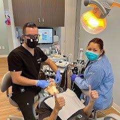 Dentist and Dental Assistant