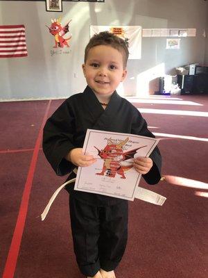 My son Zane getting his yellow striped belt