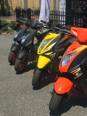 Kymco Agility50 (Black), Kymco Super 8 (Yellow), Kymco Agility 125 (Orange)