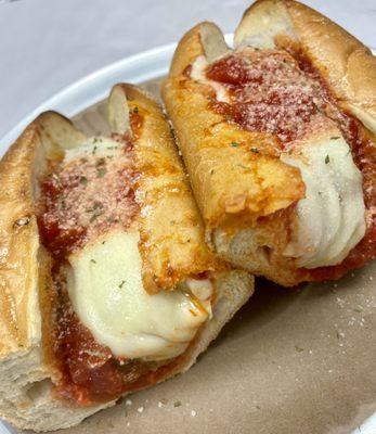 Meatball Parmesan on a fresh baked daily toasted bun..