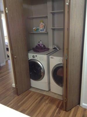 Modern laundry with ample storage space!