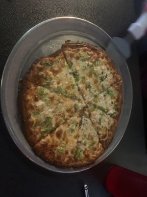 Green pepper and onion cauliflower crust.