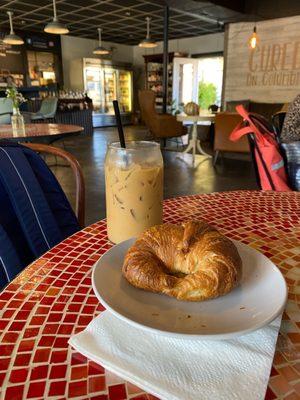 Iced white chocolate latte and plain croissant