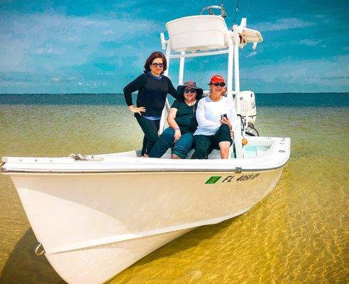 Best Friends forever sharing a Island Hop Boat Tour filled with shelling, dolphin watching, and a secluded island picnic!